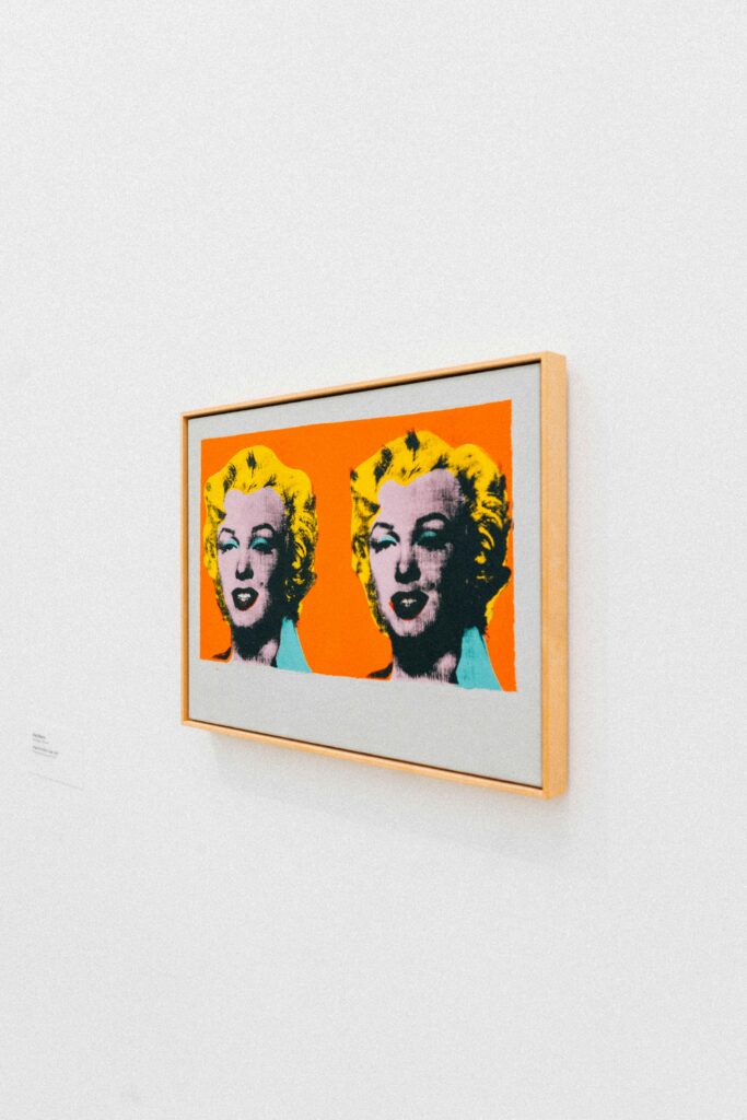 pexels-photo-2763966-2763966 Vibrant pop art portrait of a famous icon on gallery wall.